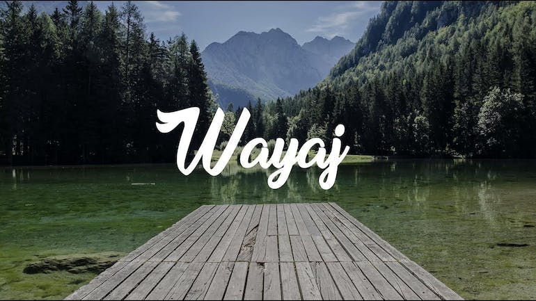 A screenshot of the homepage of Wayaj, showing a wooden dock extending over a lake with green trees on both sides and a blue mountain in the background, and the text "Wayaj" across the center in white lettering.